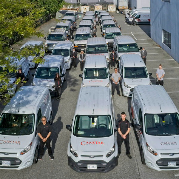 row of cars and employees